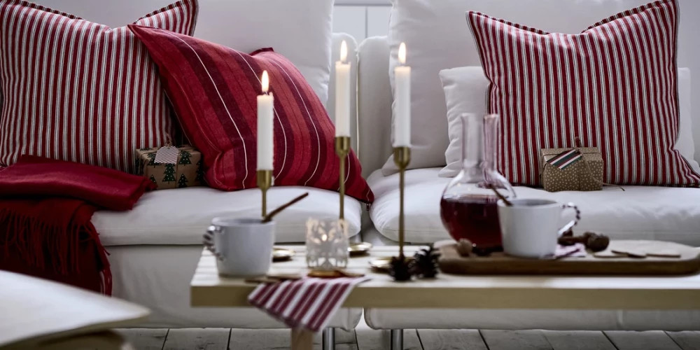 Латвийцы находят уют в зимней темноте с помощью гирлянд и свечей