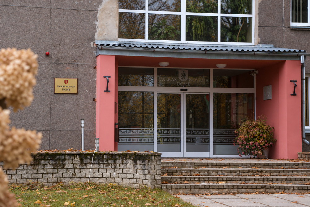 Entrance of the Valkas novada dome municipal building in autumn.